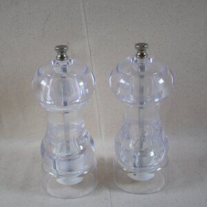 A set of Salt & Pepper Clear Acrylic Grinder style, 6 in tall x 2 in Dia.